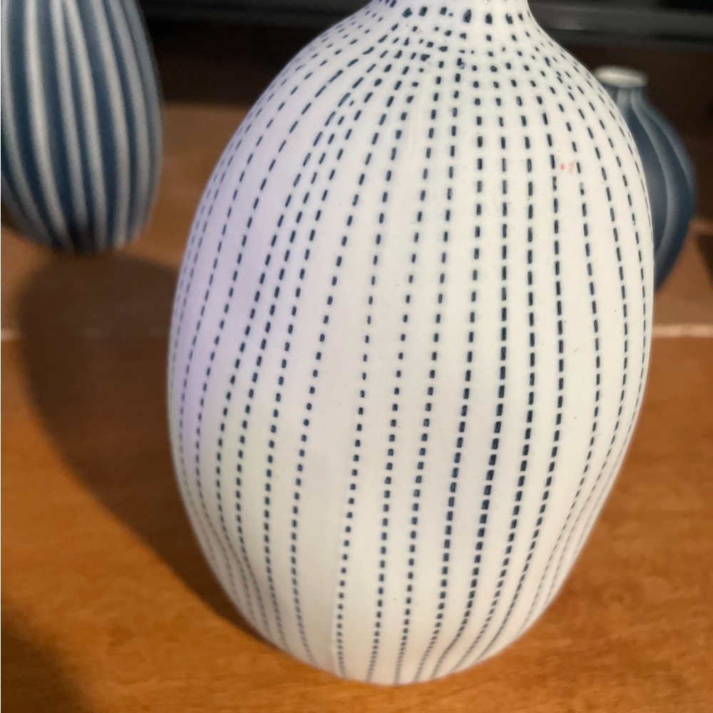 Kaolinite vase 
White and Blue Striped Vase